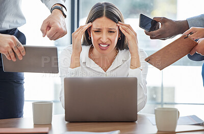 Buy stock photo Shot of a young businesswoman feeling stressed out in a demanding office environment at work