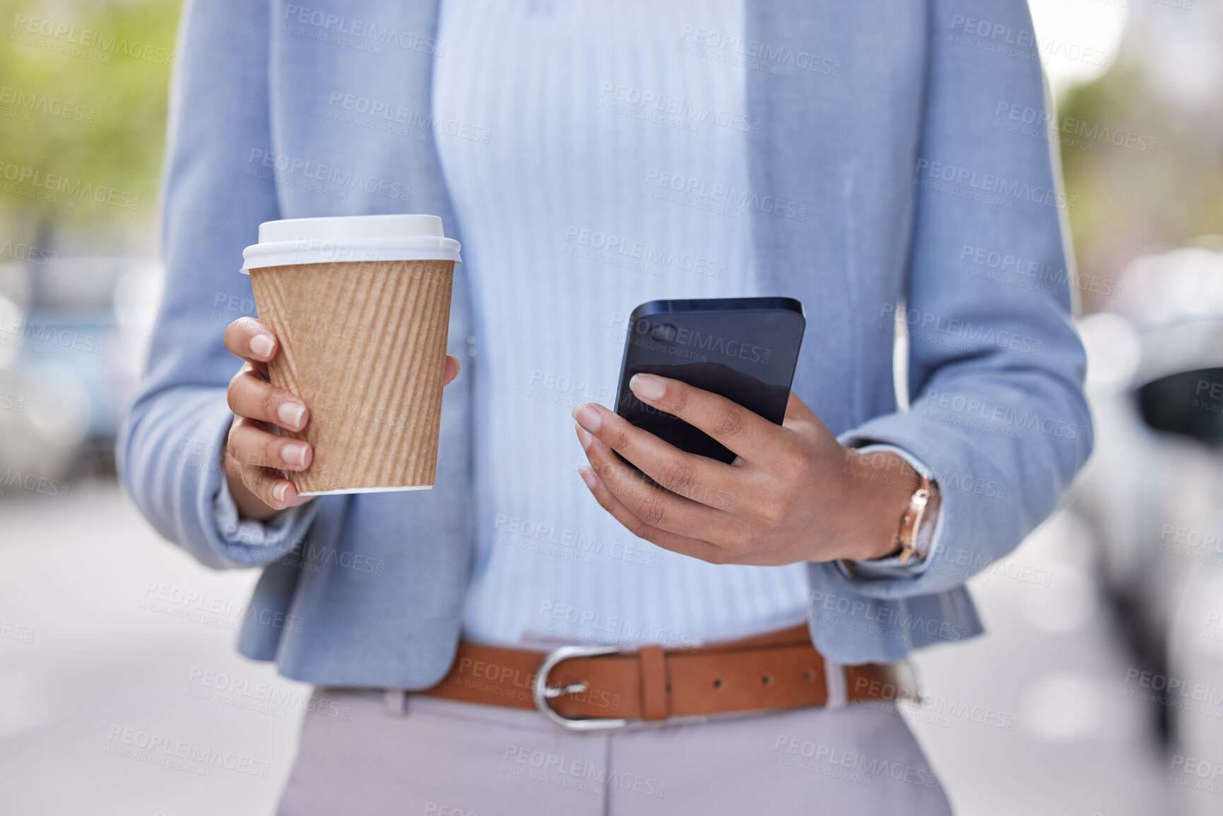 Buy stock photo Cropped shot of an unrecognizable businessman using his cellphone outside