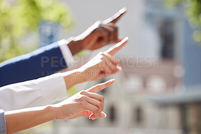 Buy stock photo Hands, businesspeople and pointing direction in outdoor for support, teamwork and solution by problem solving together.  Group, employees for collaboration with vote, development and mission idea