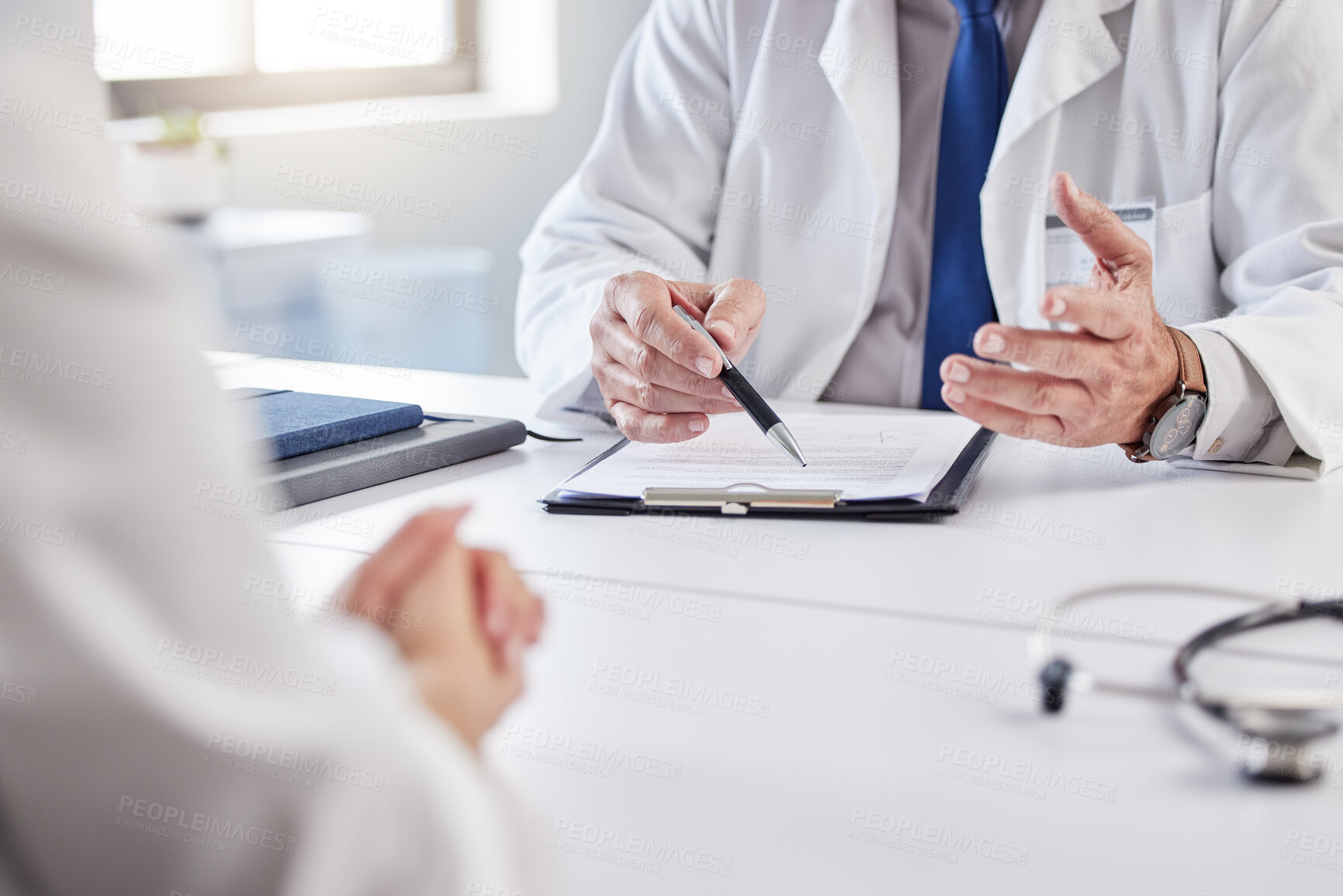 Buy stock photo Hands, doctor and patient with consultation in clipboard for medical history, information or report. People, medic and documents for admin, insurance and checklist for healthcare service in hospital