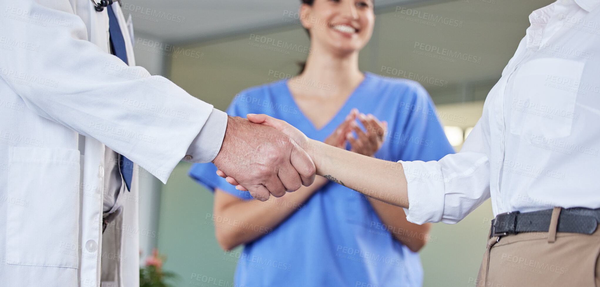 Buy stock photo Healthcare, partnership or people handshake with applause at hospital for welcome, support or celebration. Clinic, success or doctor shaking hands for patient recovery, thank you or congratulations