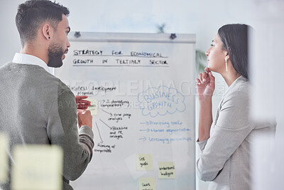 Buy stock photo Thinking, whiteboard and people planning for business growth, brainstorming or strategy in teamwork or collaboration. Talking, presentation and professional woman, man and office solution from behind