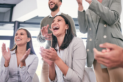 Buy stock photo Shot of a group of businesspeople applauding during a meeting