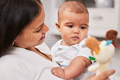 Buy stock photo Shot of a mother holding her adorable baby boy