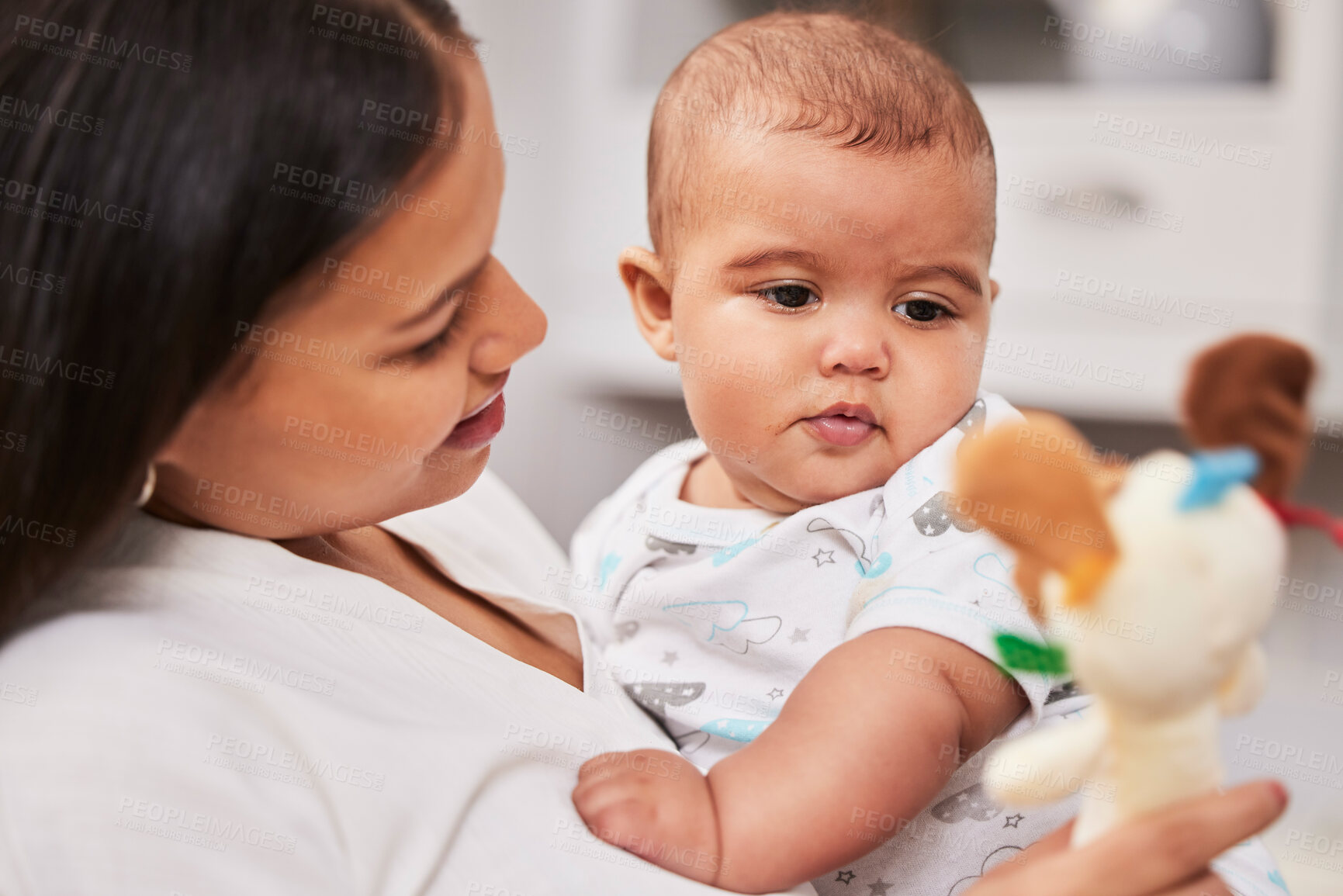 Buy stock photo Woman, baby and bonding in nursery for growth, development and family home in playing with toy. Mother, happy and comfort with infant, smile or hug for support, love and wellness in health or nurture