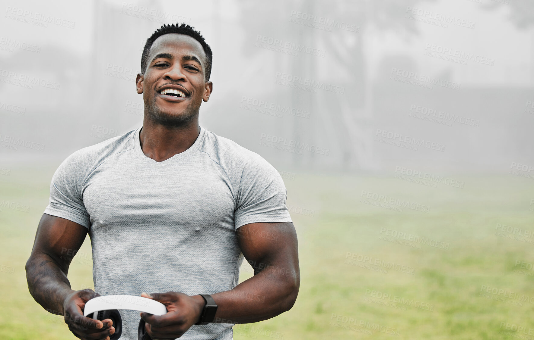 Buy stock photo Smile, fitness and music with black man in park for exercise, streaming and cardio. Health, bodybuilding and workout with portrait of runner training in nature for sports, performance and wellness