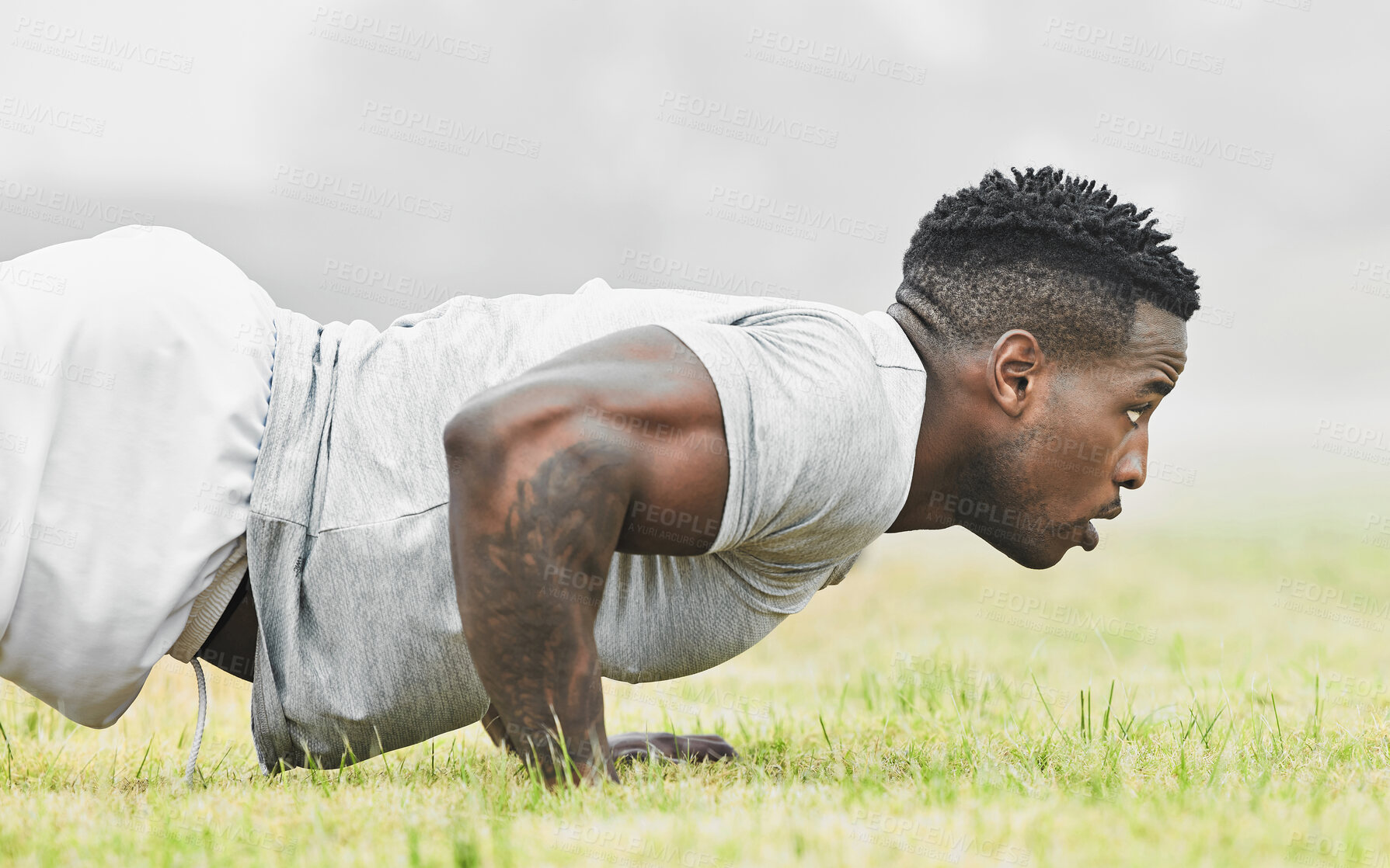 Buy stock photo Nature, sports and black man with push up workout for arm muscles, strength and health. Fitness, fog and African athlete with plank exercise for core training on grass in outdoor park or field.