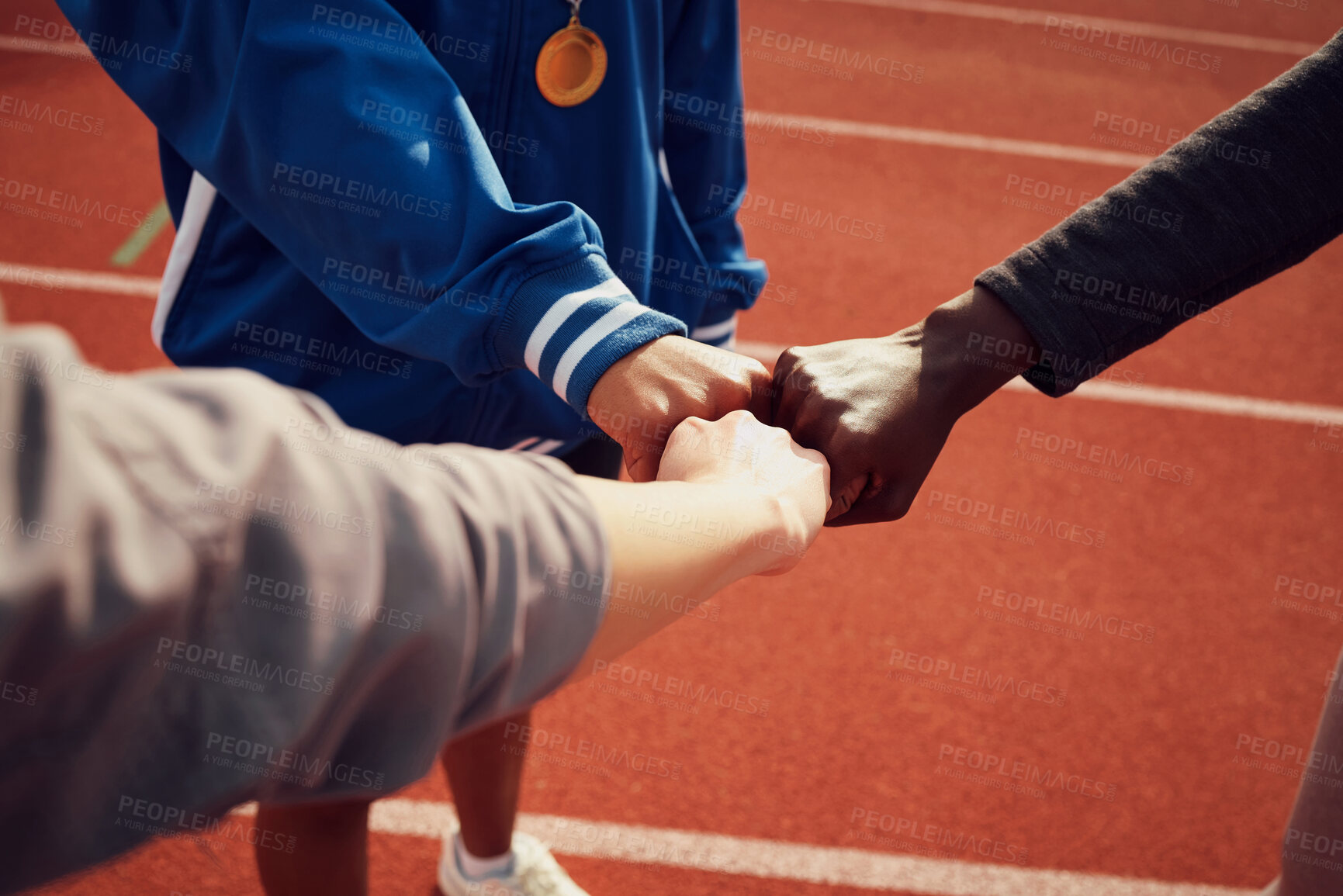 Buy stock photo People, diversity and fist bump in fitness for unity, trust or support together on stadium track. Hands of group touching fists in team building for sports motivation, teamwork or goals outdoors