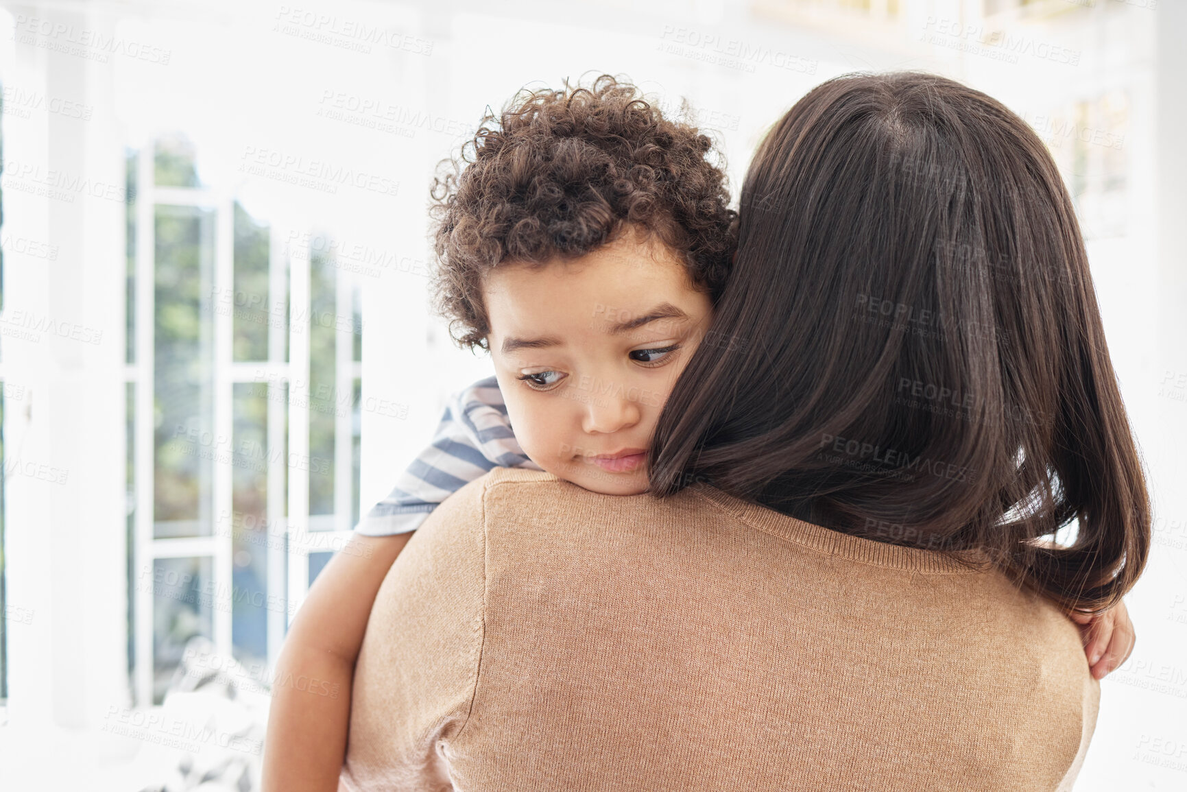 Buy stock photo Boy, mother and embrace child in home for bonding, comfort and development with love, care and trust. Parent, kid and hugging in house for safety, security and support with motherhood or wellness