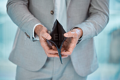 Buy stock photo Shot of a unrecognizable male holding his wallet at home