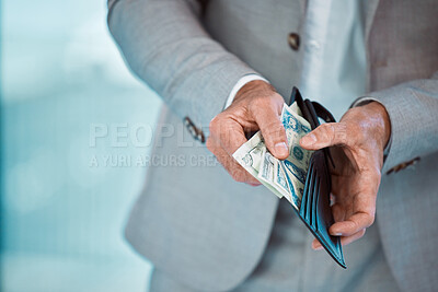 Buy stock photo Shot of a unrecognizable male holding his wallet at home