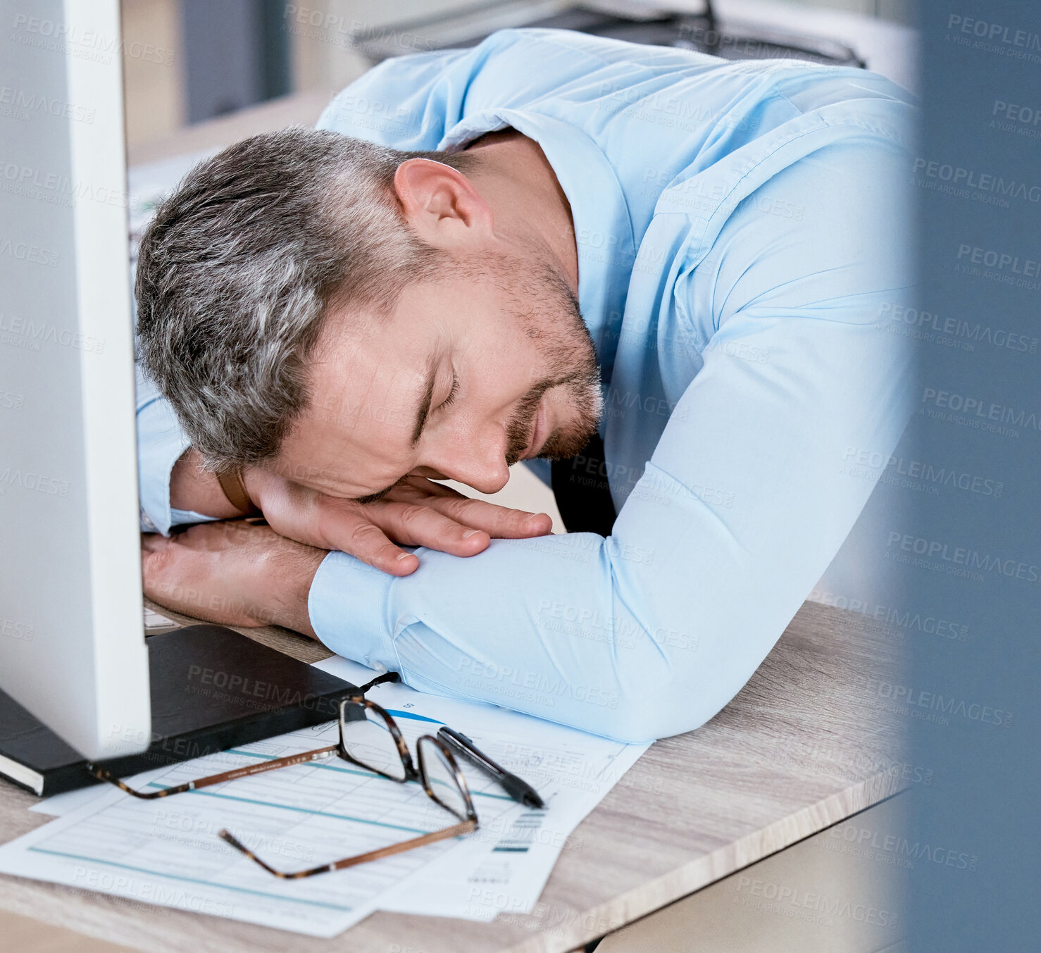 Buy stock photo Tired, desk and business man in office with burnout for working on deadline, project and online report. Corporate, sleeping and exhausted, fatigue and overworked employee with insomnia on computer