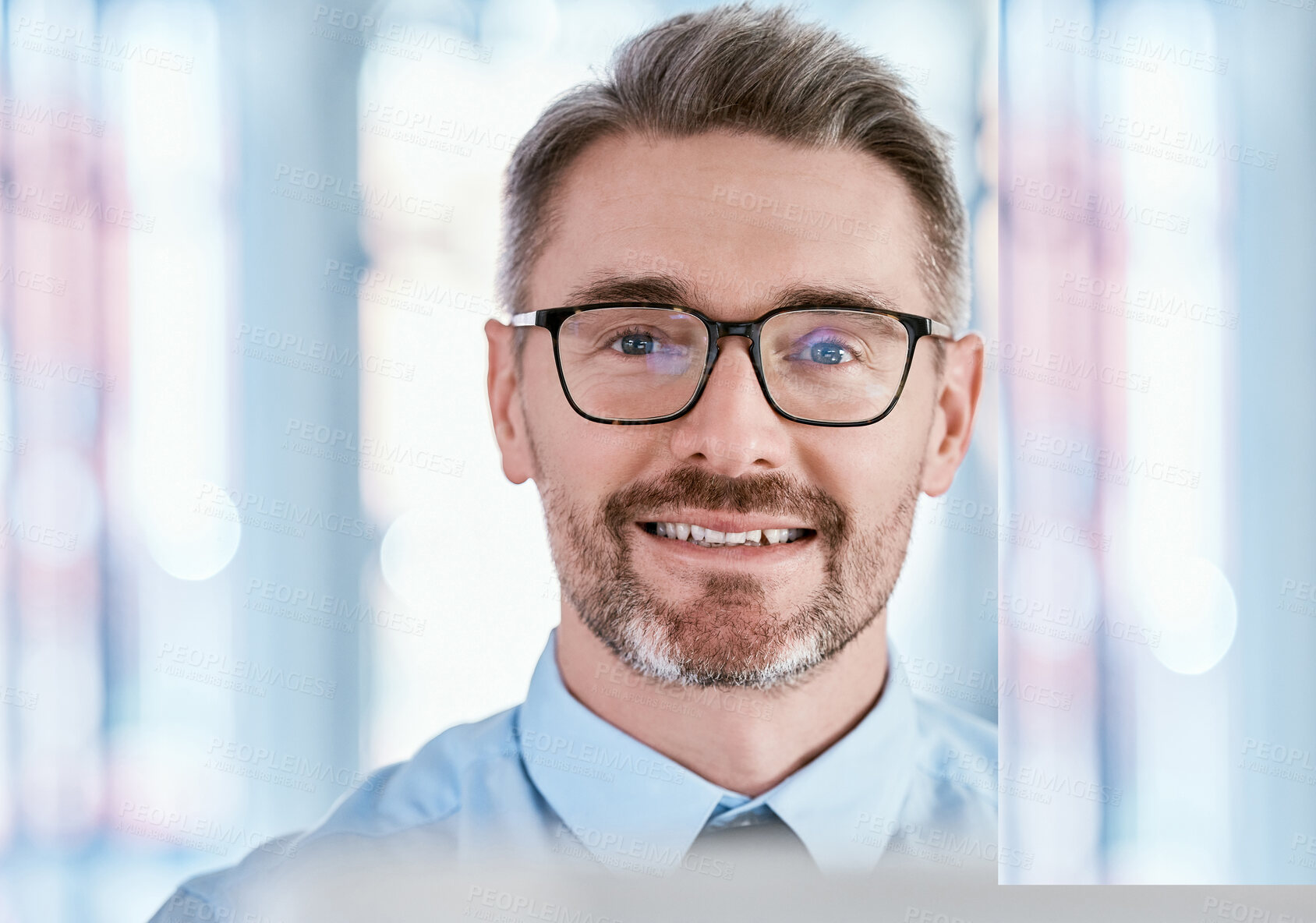 Buy stock photo Portrait of a mature businessman working in an office