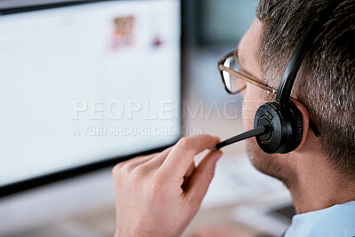Buy stock photo Closeup shot of a mature call centre agent working on a computer in an office