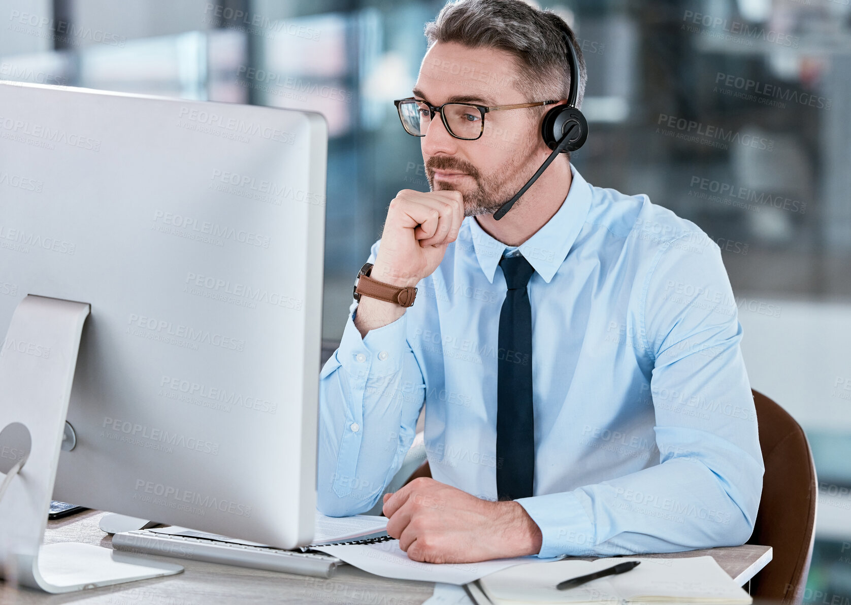 Buy stock photo Customer service, call center and man on computer thinking for advice, online help and consulting. Corporate office, telemarketing and person with headset for contact, crm support and communication