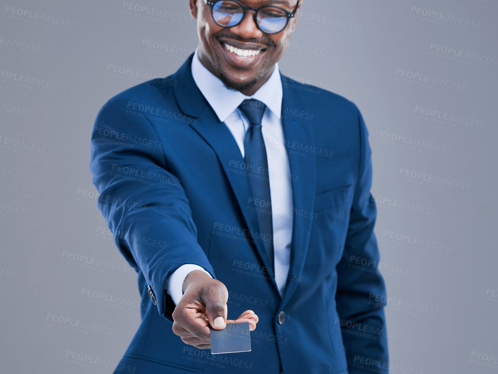 Buy stock photo Business man, credit card and payment in studio for giving, purchase and buying for service. Hand, black person or event planner with debit for expenses, banking detail and finance by gray background