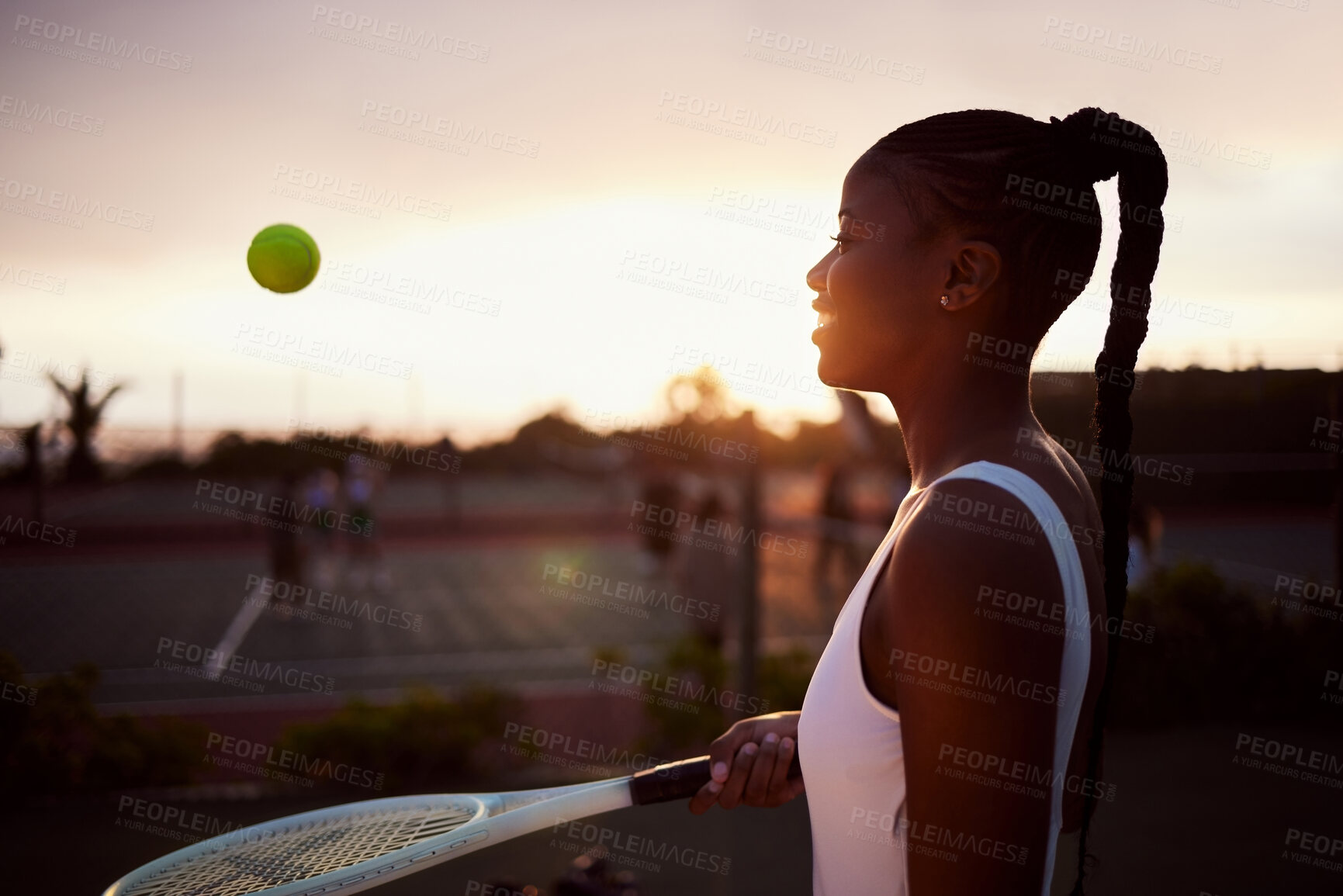 Buy stock photo Women, tennis and hit ball on court for game, professional and training with racket at sunset. Contest, sports and practice outdoor for competition, tournament and fitness with exercise or workout