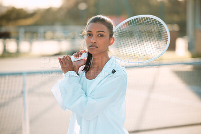 Buy stock photo Tennis court, game and woman in portrait for serve, competition and match challenge in sports. Serious, Indian person or athlete with racket for playing, practice and fitness training for tournament