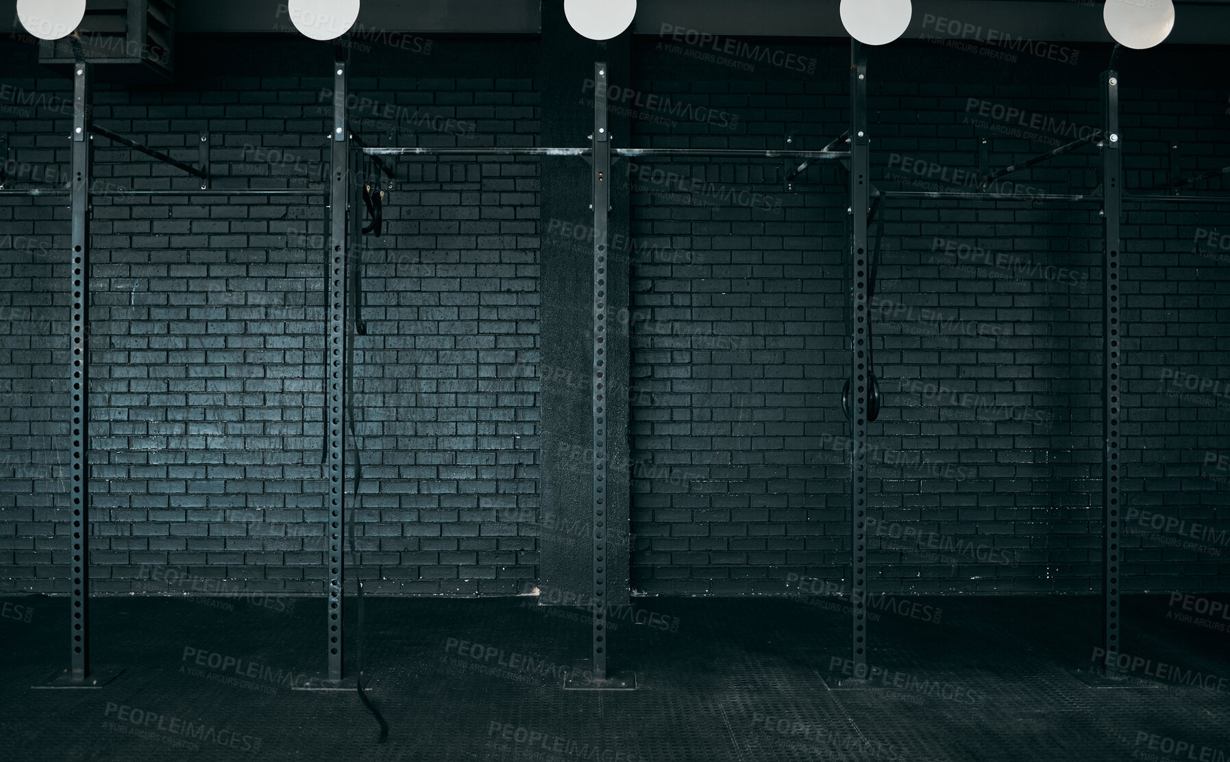 Buy stock photo Shot of an empty and dark gym