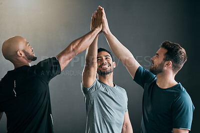 Buy stock photo High five, group and athletes in gym for fitness, training or workout class for wellness together. Happy, sports and team of men with hands united for exercise victory, collaboration or goals.