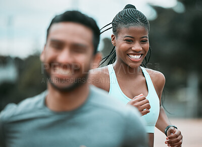 Buy stock photo Shot of two friends running together