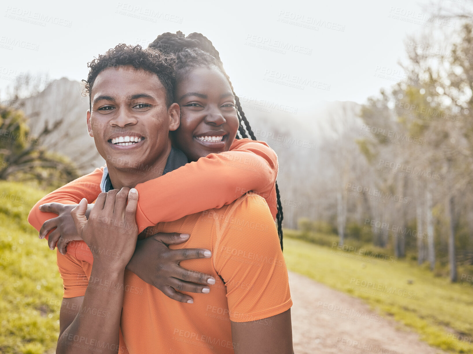 Buy stock photo Nature, portrait and black couple with hug for fitness, exercise and outdoor for bonding together. Happy people, man and woman with embrace for training, support and commitment for marathon goals