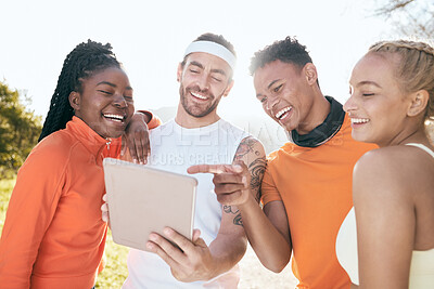 Buy stock photo Shot of a diverse group of friends standing together and using a digital tablet during their outdoor workout