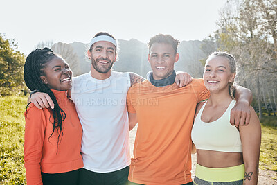 Buy stock photo Shot of a diverse group of friends standing together during their outdoor workout