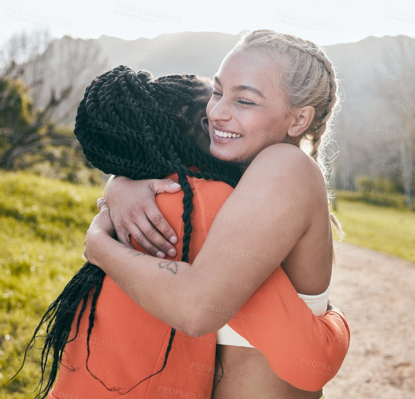 Buy stock photo Fitness, hug and success with woman friends outdoor in nature together for marathon running. Love, smile and support with happy athlete people embracing in park for exercise, training or workout