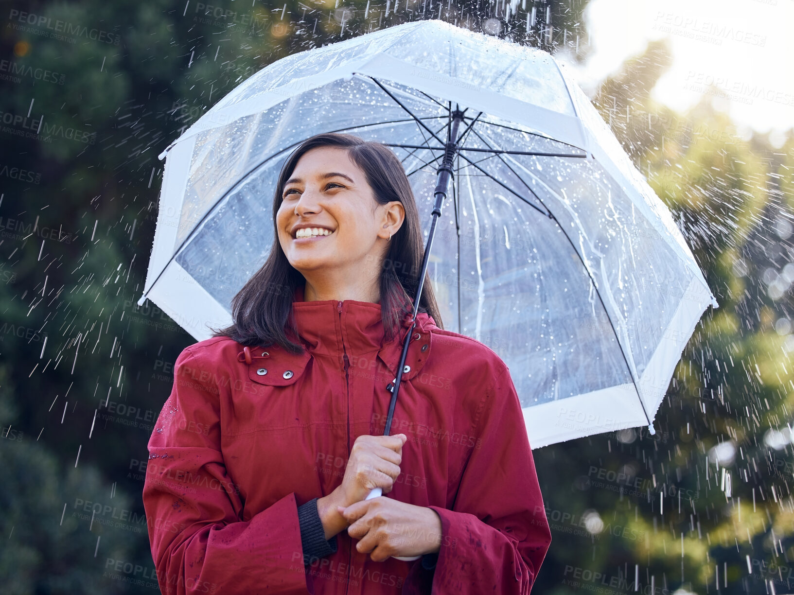 Buy stock photo Umbrella, rain and woman with smile, walking and carefree in weather of Seattle, travel and explore in vacation. Park, water and girl in raincoat, outdoor and happy in winter, holiday and Washington