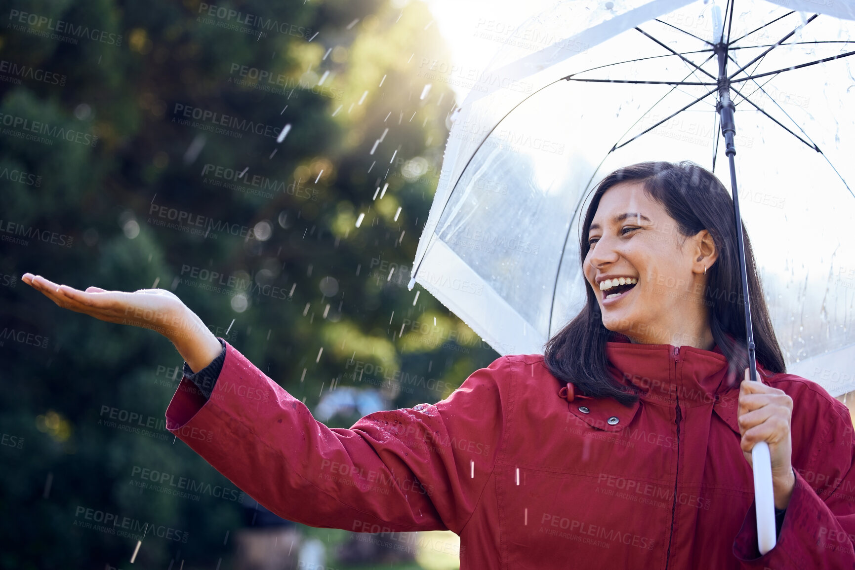 Buy stock photo Umbrella, rain and woman with smile, touch and carefree in weather of Seattle, travel and explore in vacation. Park, water and girl in raincoat, outdoor and happy in winter, insurance cover and fun