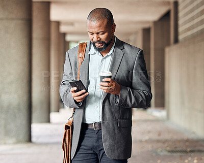 Buy stock photo Cellphone, coffee and businessman in city commuting to corporate office while networking. Travel, town and African male employee browsing on social media, mobile app or internet while walking to work
