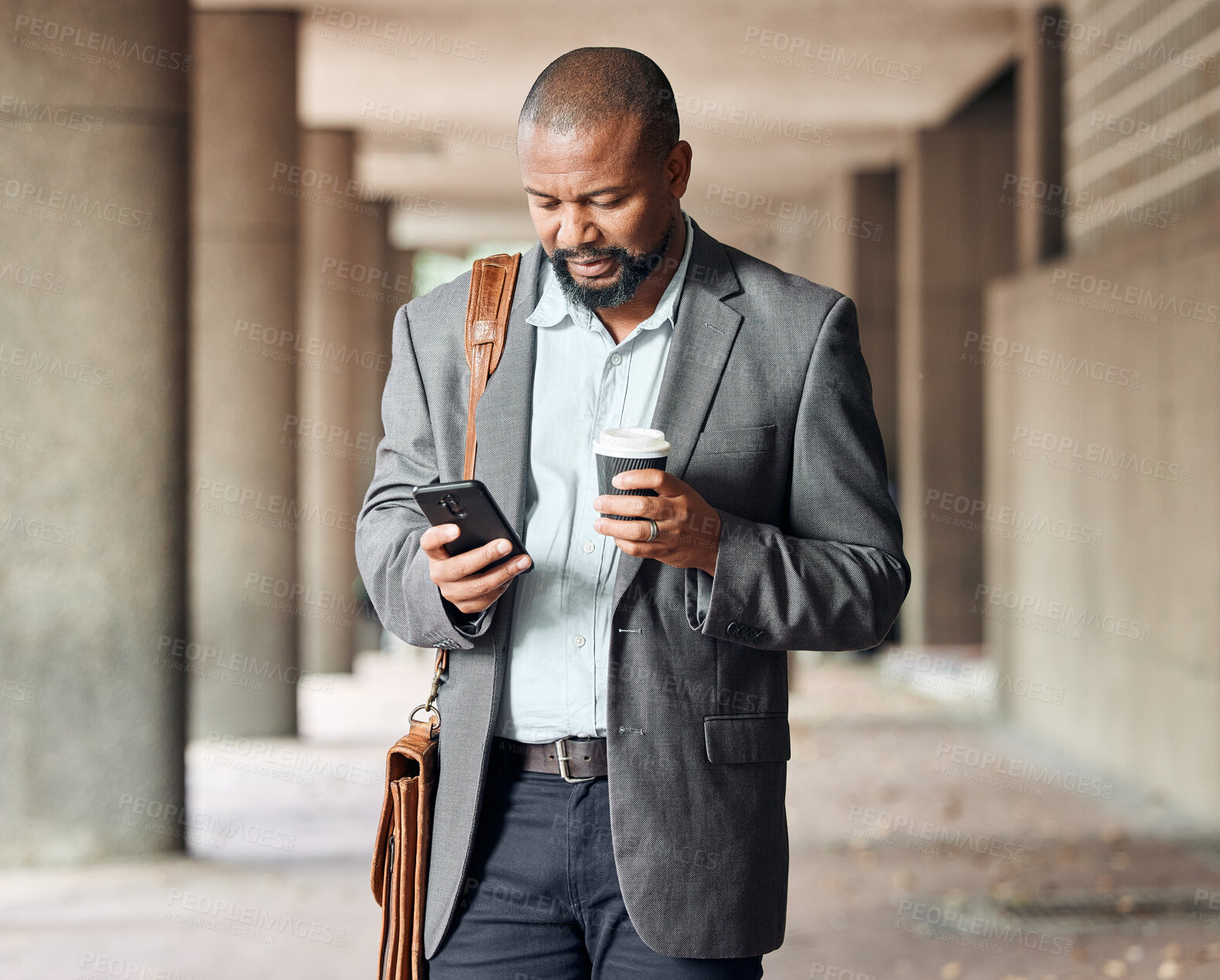 Buy stock photo Cellphone, coffee and businessman in city commuting to corporate office while networking. Travel, town and African male employee browsing on social media, mobile app or internet while walking to work