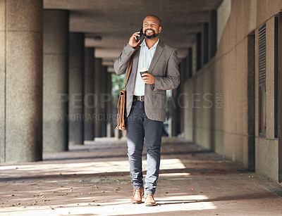 Buy stock photo Shot of a mature businessman using his smartphone to make a phone call