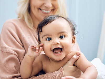 Buy stock photo Shot of a woman bonding with her adorable baby girl