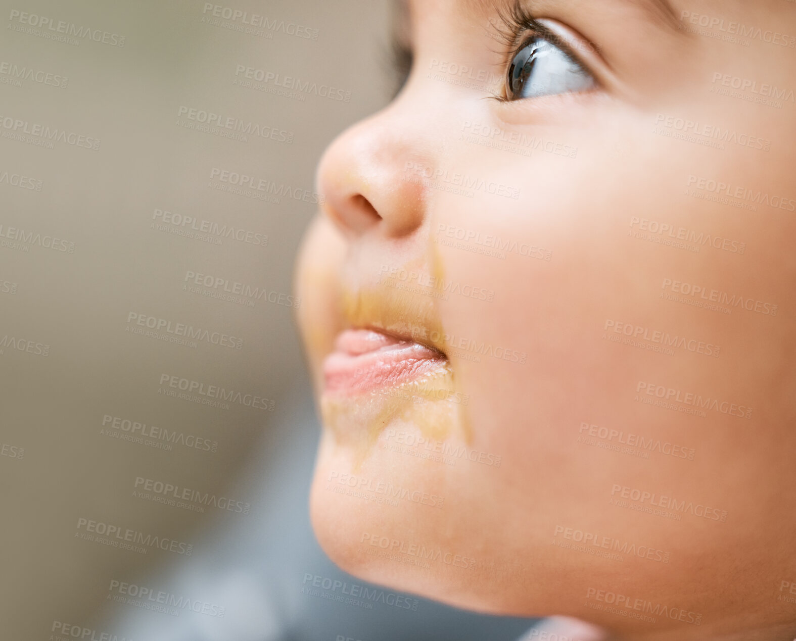 Buy stock photo Shot of an adorable baby girl's mouth covered with baby food