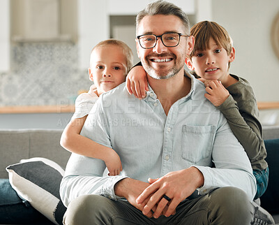 Buy stock photo Dad, kids and hug on lounge portrait, peace and single parent love for boys in home. Father, children and embrace for security on couch for care in childhood, relationship and comfortable bonding