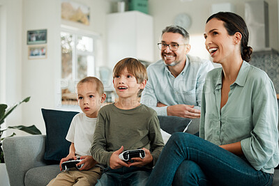 Buy stock photo Brothers, family and sofa with console controller for gaming or online challenge, together with support for play. Children, esports or multiplayer experience in home for development with technology