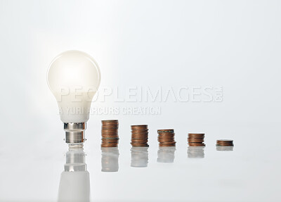 Buy stock photo Lightbulb, coins and finance with savings for accounting ideas, problem solving and cash innovation of bankruptcy. Money, financial budget and bank value for security, solution and cost reduction