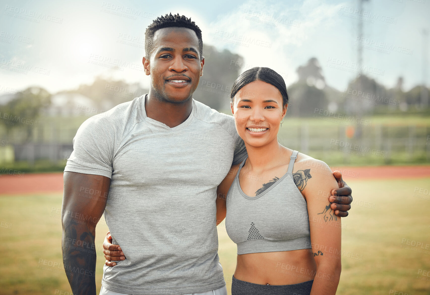 Buy stock photo Happy couple, outdoor and portrait on field for fitness, together and teamwork in resting, hug and sports. Woman, man and routine for bonding, strong muscle and race track with support, love and care