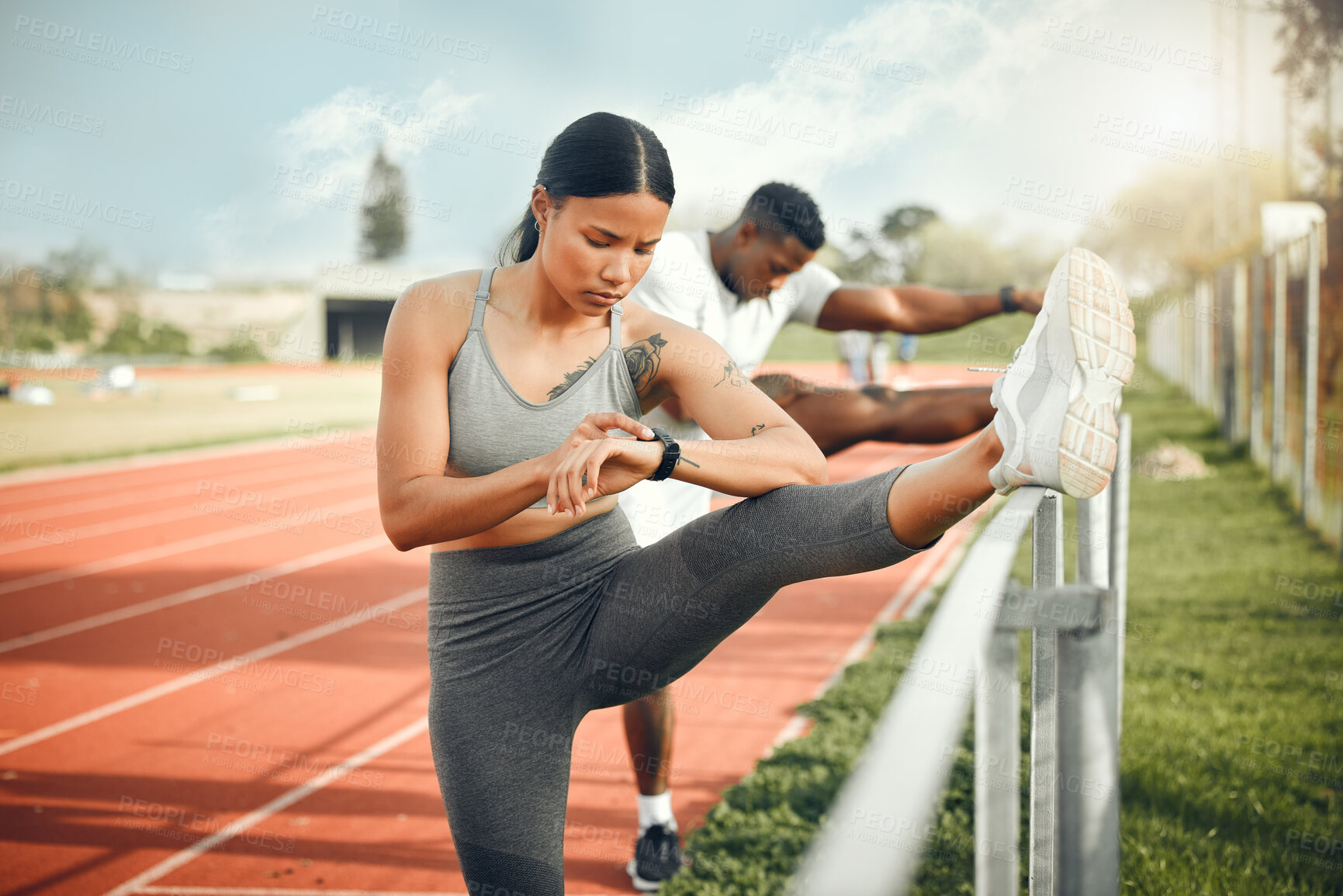 Buy stock photo Woman, stretching and smartwatch for fitness, heart rate and step count for running on track. Athlete, together and man or team for cardio, exercise and outdoor for workout with time and training