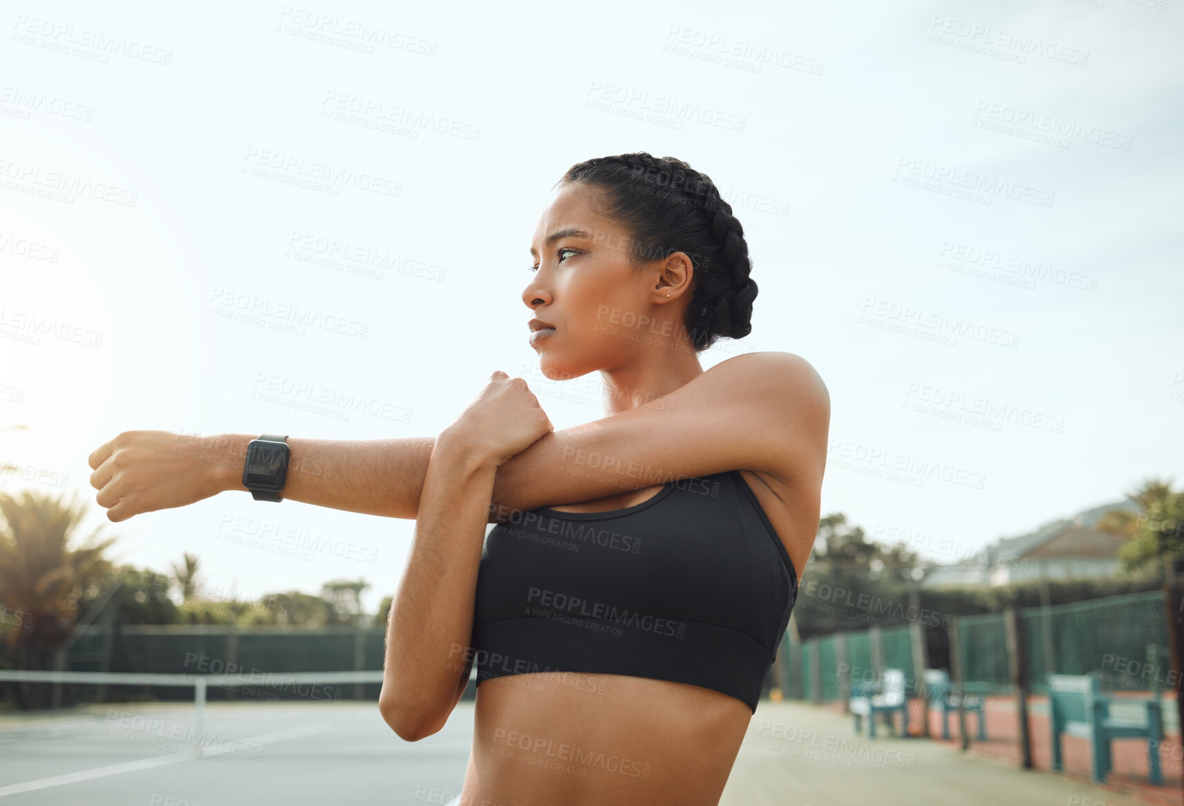 Buy stock photo Outdoor, fitness and woman with stretching arm for morning exercise, thinking or workout routine. Sport, athlete and female person in thought for match, preparing or warm up muscles on tennis court