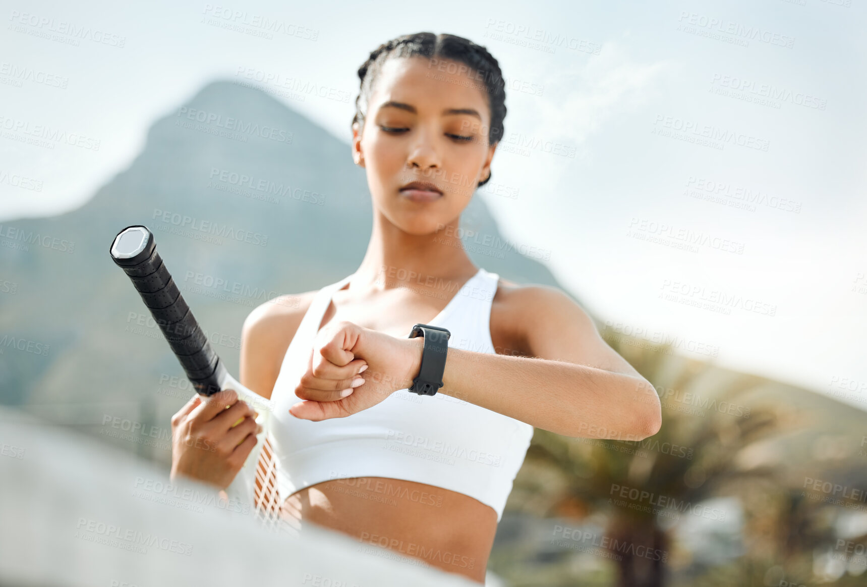 Buy stock photo Black woman, tennis and watch for fitness on court with time of exercise match, performance and progress. Athlete, person and monitor for sports training, health results or game target on app outdoor