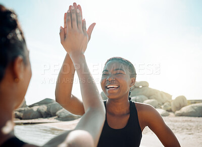 Buy stock photo Fitness, high five and woman friends on beach together for celebration, motivation or success. Exercise, smile and team building with athlete people outdoor on coast for cardio, training or workout