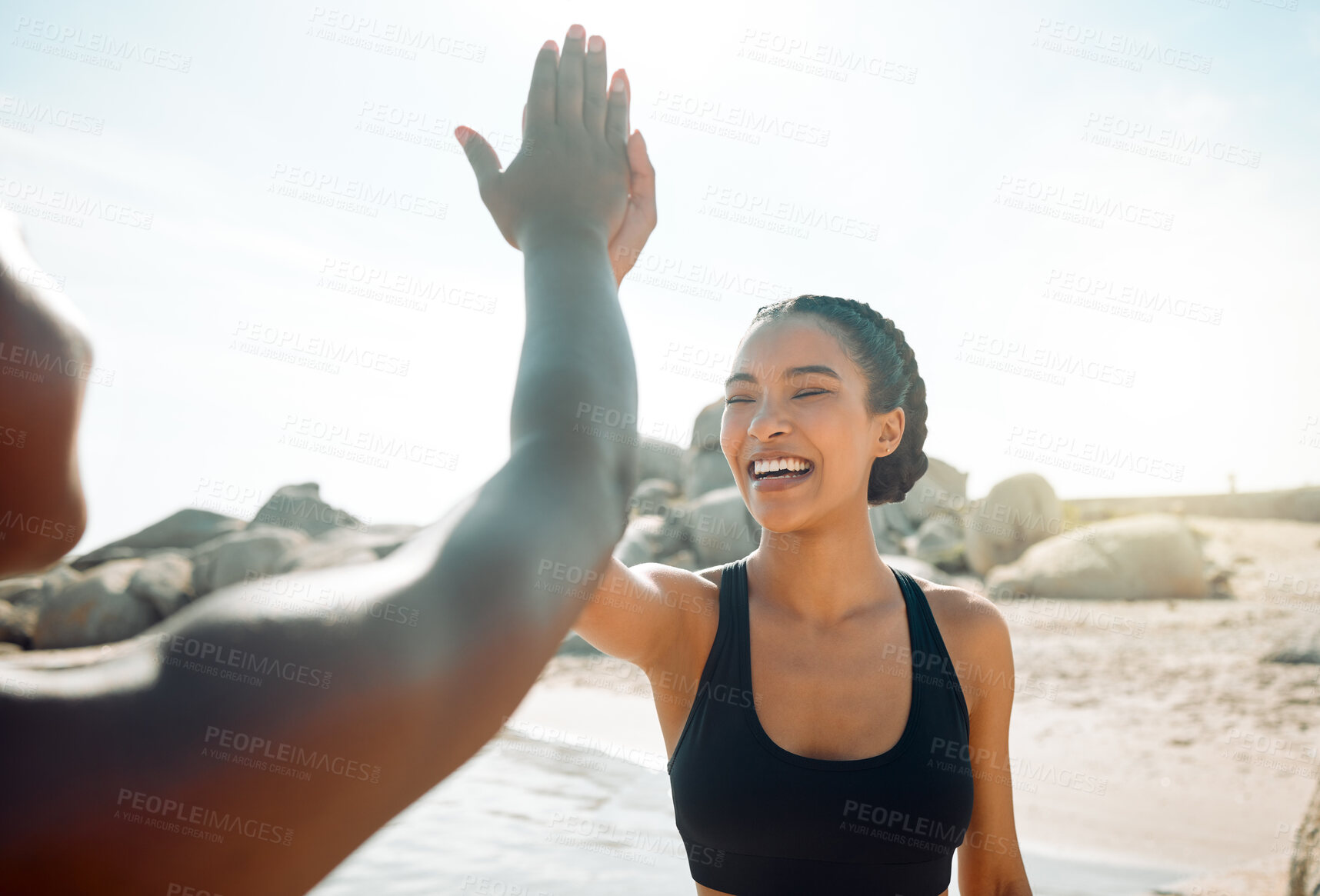 Buy stock photo Exercise, high five and woman friends on beach together for celebration, motivation or success. Fitness, smile and team building with athlete people outdoor on coast for cardio, training or workout