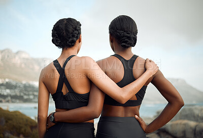 Buy stock photo Shot of a two friends enjoying the view during a workout