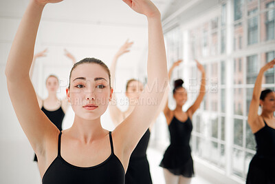 Buy stock photo Shot of a group of ballet dancers practicing a routine