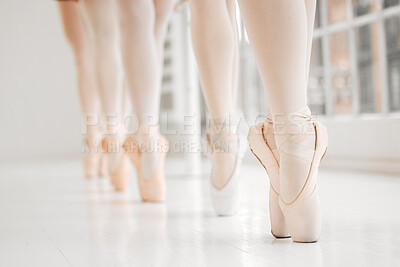 Buy stock photo Shot of a group of ballet dancers during their rehearsal
