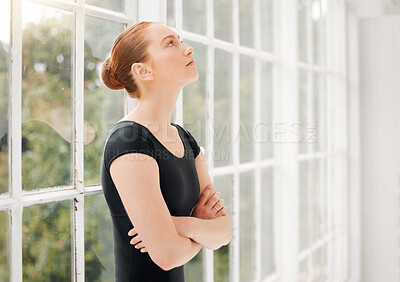 Buy stock photo Shot of a ballet dancer standing alone looking nervous and stressed