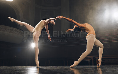 Buy stock photo Shot of a group of ballet dancers practicing a routine on stage
